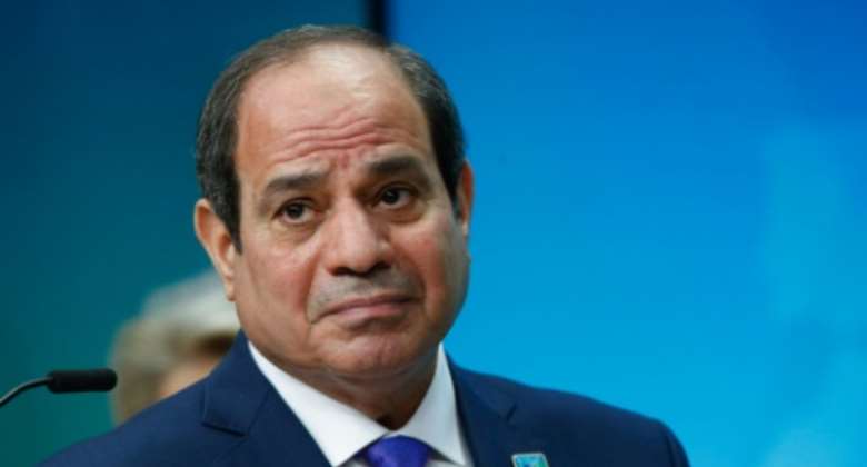 Egypt's President Abdel Fattah Al-Sisi, seen at a February 2022 summit in Brussels, has been urged by the United States to probe the death of a prominent economist.  By JOHANNA GERON POOLAFPFile