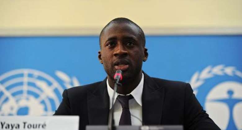 Ivory Coast's football player Yaya Toure speaks during a press conference as he was appointed the United Nations Environment Program goodwill ambassador at the UNEP headquarters in the Kenyan capital Nairobi on October 29, 2013.  By Tony Karumba AFP