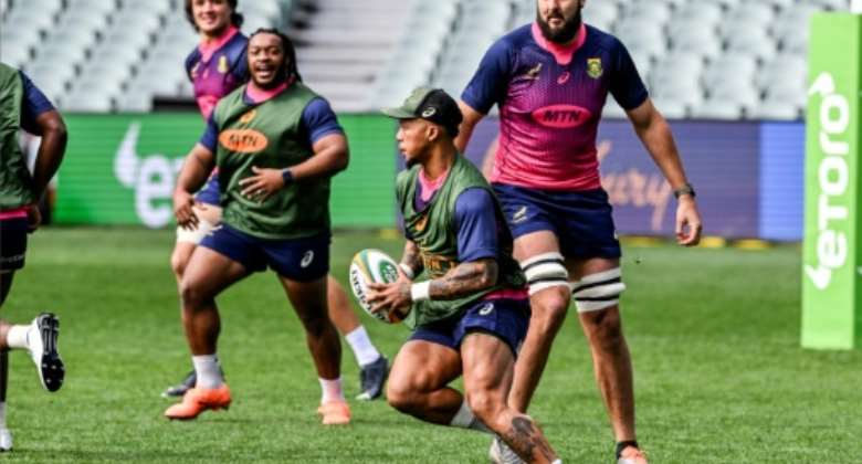 Elton Jantjies running with the ball in training in Adelaide ahead of a Rugby Championship match against Australia in August.  By Brenton EDWARDS AFP