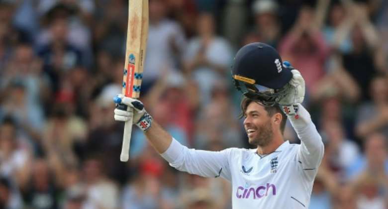 England's Ben Foakes celebrates reaching his century.  By Lindsey Parnaby AFP