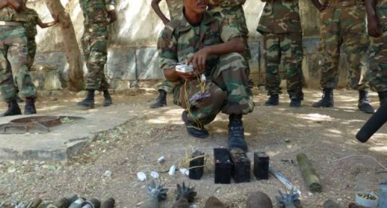 Ethiopian troops display weapons left behind by Somalian Shebab rebels after an earlier defeat this month.  By Jenny Vaughan AFPFile