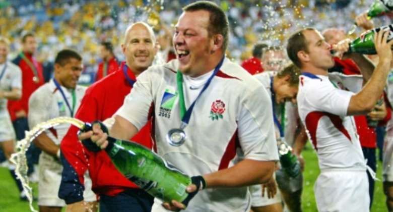 Former England hooker Steve Thompson, pictured celebrating the team's 2003 World Cup final win.  By ODD ANDERSEN AFPFile