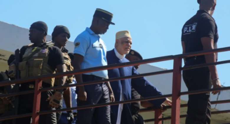 Former president Ahmed Abdallah Sambi arriving at the courthouse in Moroni on November 21.  By Ibrahim YOUSSOUF AFP