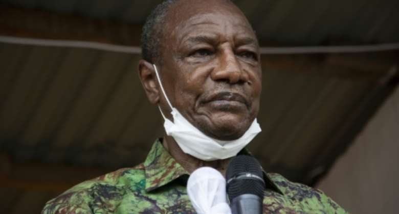 Former president Alpha Conde, pictured at an election rally in October 2020.  By CAROL VALADE AFPFile