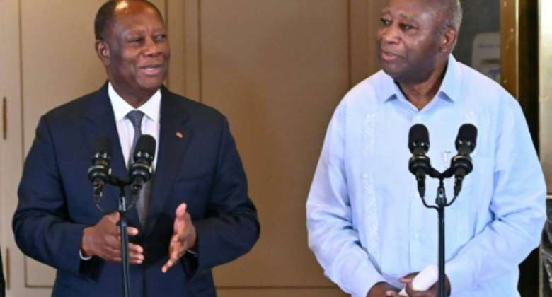 Former presidents and erstwhile rivals: Alassane Ouattara, left, and Laurent Gbagbo.  By Issouf SANOGO AFPFile