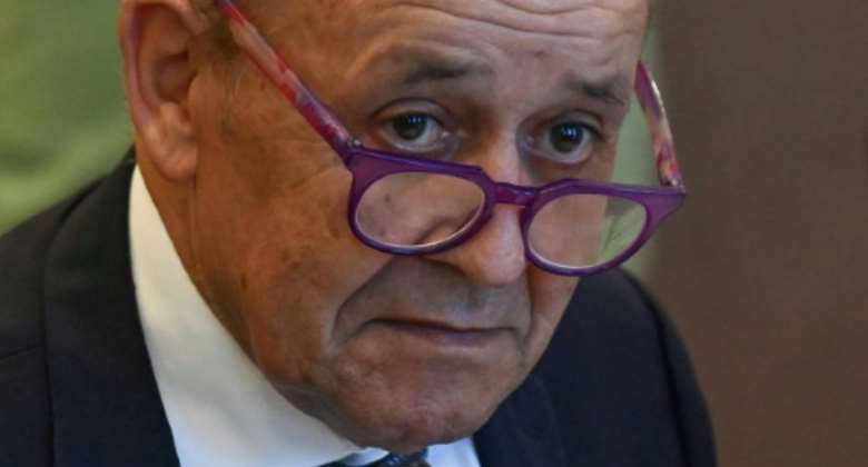 French Foreign Minister Jean-Yves Le Drian, pictured in September 2021, says France and Algeria should move past wounds of the past.  By Attila KISBENEDEK AFPFile