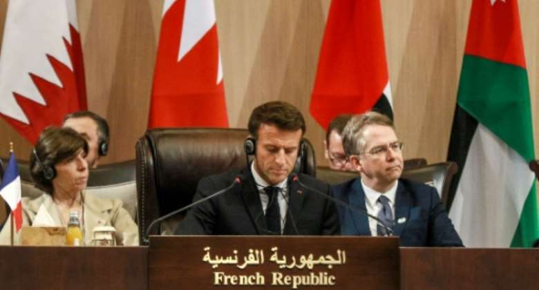 French President Emmanuel Macron attends the Baghdad Conference for Cooperation and Partnership in Sweimeh in Jordan on Tuesday.  By Khalil MAZRAAWI AFP