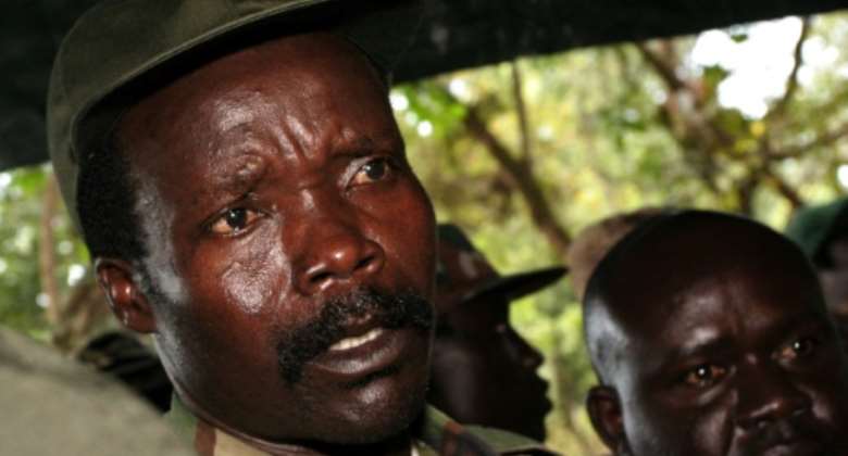 Fugitive: A rare picture of Kony, seen speaking to journalists in southern Sudan in November 2006.  By STUART PRICE POOLAFPFile
