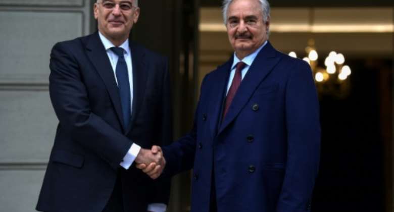 Greece has long favoured Libya's eastern strongman Khalifa Haftar R in his power struggle with the Turkish-backed government in the capital Tripoli.  By Aris MESSINIS AFPFile