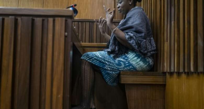 In the dock: Nomia Rosemary Ndlovu is accused of a string of brutal murders.  By Emmanuel Croset AFP