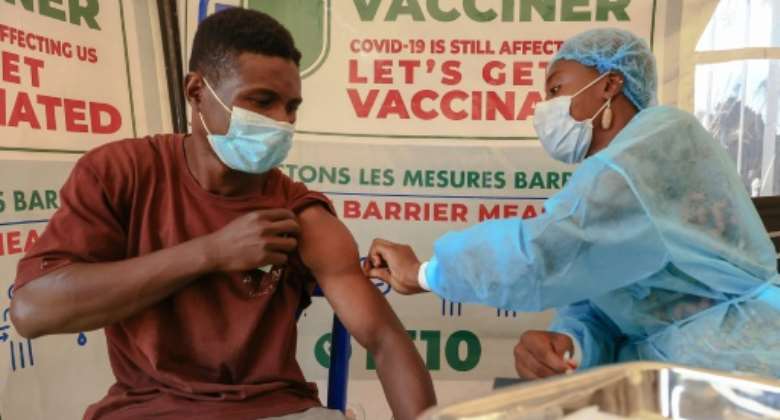 In the week before Sunday's first match in the Africa Cup of Nations in Cameroon, many fans have overcome reluctance and asked to be vaccinated.  By Daniel Beloumou Olomo AFP