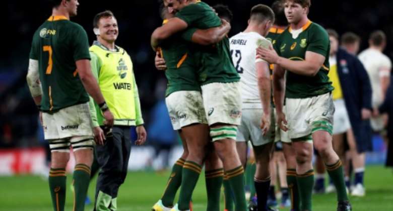 Joy of victory - South Africa player celebrate after a 27-13 win over England at Twickenham.  By Ian Kington AFP
