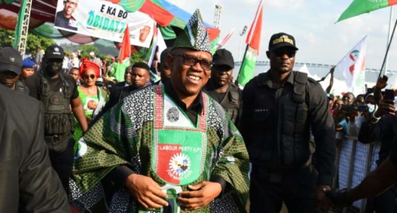 Labour Party's Presidential candidate Peter Obi C is appealing to many young Nigerians with his outsider message.  By PIUS UTOMI EKPEI AFPFile