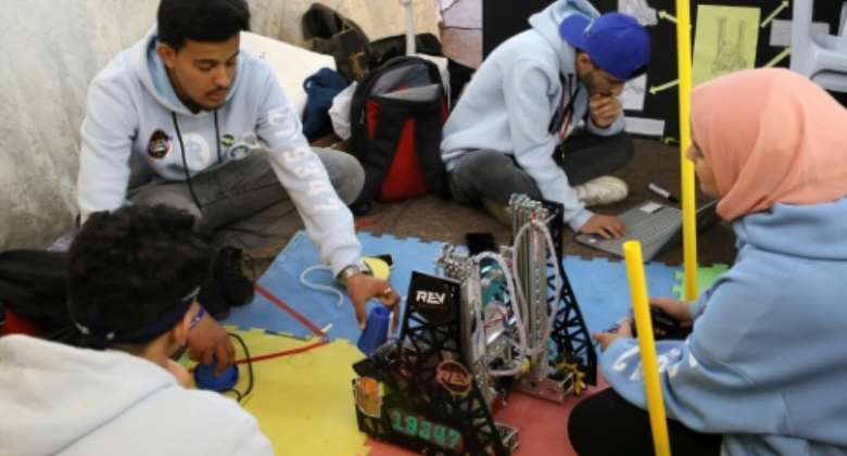 Libyan students at a local robotics competition in Tripoli.  By Mahmud Turkia AFP