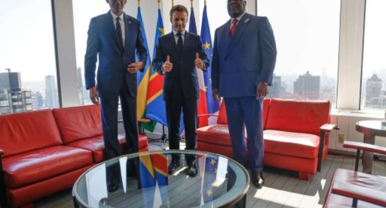 L-R Rwandan President Paul Kagame, French President Emmanuel Macron and Democratic Republic of Congo President Felix Tshisekedi meet at France's permanent mission to the United Nations.  By Ludovic MARIN AFP