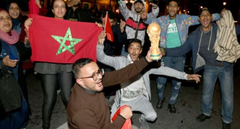 Moroccans in Rabat cheered and sang after their team beat Spain at the World Cup.  By - AFP