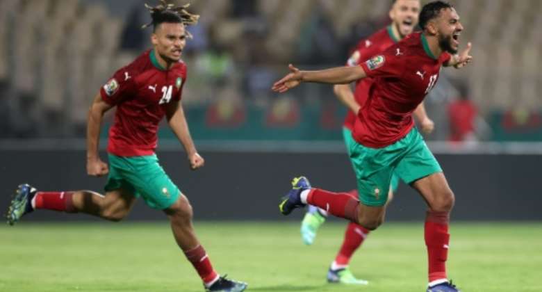 Morocco midfielder Sofiane Boufal R celebrates scoring the only goal of an Africa Cup of Nations Group C match against Ghana.  By Kenzo Tribouillard AFP