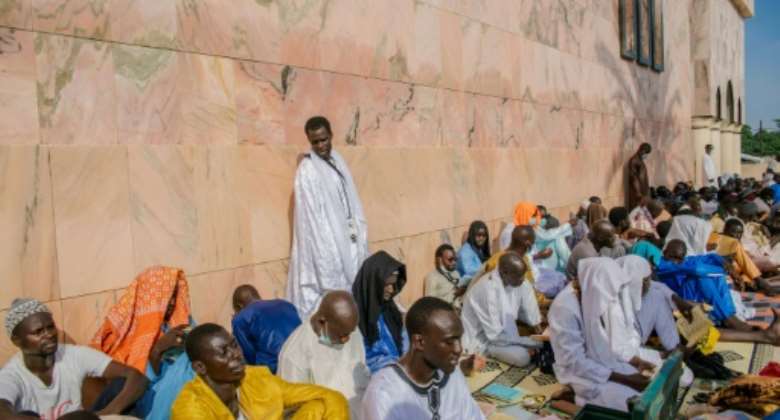 Pilgrims came to pray in the Great Mosque of Touba.  By CARMEN ABD ALI AFP