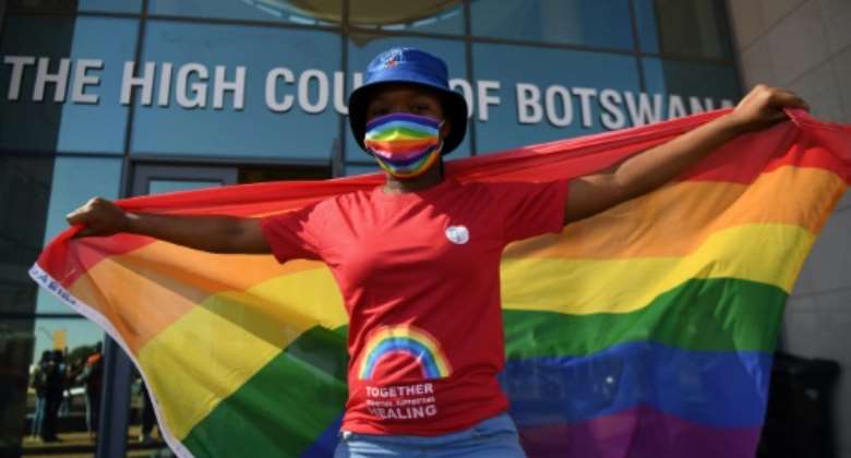 Rainbow campaign: Activists gathered outside the Botswana High Court on October 12 to press their case.  By Monirul Bhuiyan (AFP)