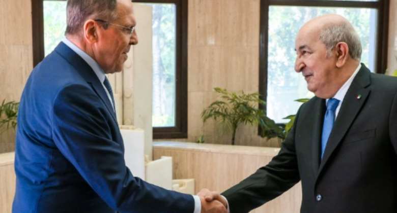 Russian Foreign Minister Sergei Lavrov L met Algeria's President Abdelmadjid Tebboune in Algiers on May 10, 2022.  By Handout RUSSIAN FOREIGN MINISTRYAFPFile