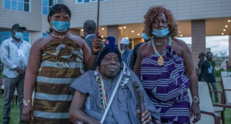 Sagbadjou Glele, centre, became king in January 2019 aged 90.  By Yanick Folly (AFP)