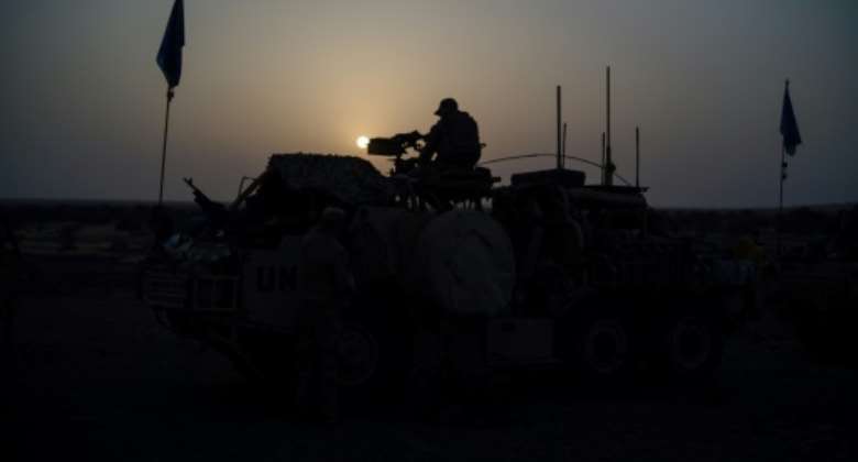 Shine a light: UN peacekeepers are among the array of forces in Mali's troubled northeast.  By FLORENT VERGNES (AFP)