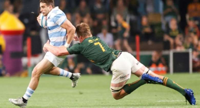 South Africa flanker Pieter-Steph du Toit R tackles Argentina full-back Juan Cruz Mallia during a Rugby Championship match in Durban on September 24, 2022..  By PHILL MAGAKOE AFP
