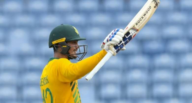 South African batsman Quinton de Kock celebrates his half century during the final T20 international against the West Indies on Saturday.  By Randy Brooks AFP