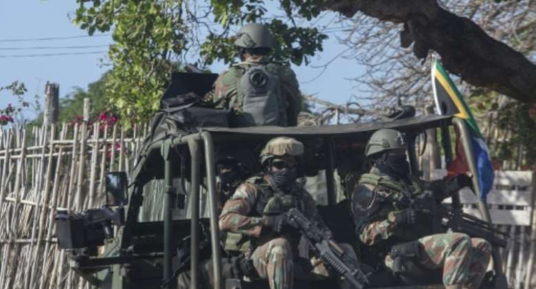 South African troops on patrol in Pemba last August.  By Alfredo Zuniga AFP
