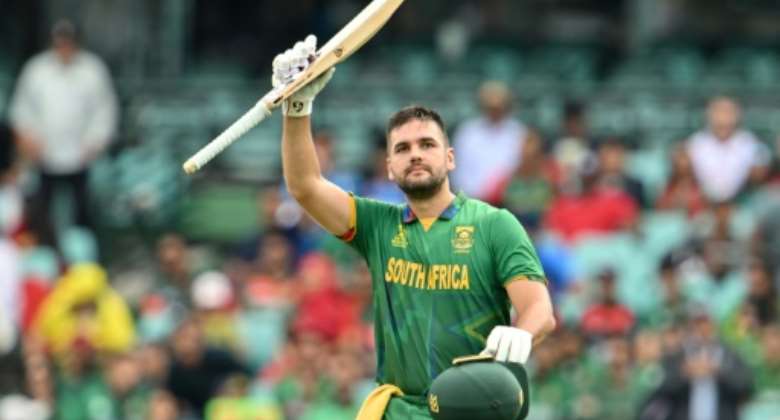 South Africa's Rilee Rossouw celebrates reaching his century.  By Saeed KHAN AFP