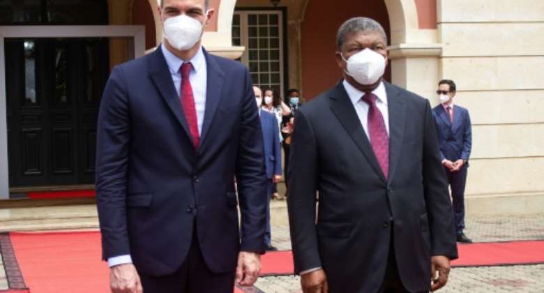 Spanish PM Sanchez, left, with Angolan President Joao Lourenco. Spain is seeking to bolster its tourism-driven economy hard hit by the coronavirus pandemic.  By Osvaldo Silva AFP