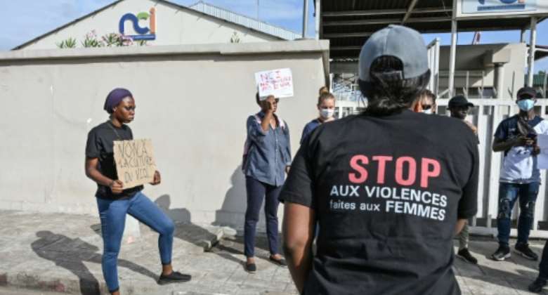'Stop violence against women': A rights group says Ivorian women suffer an average of five sexual assaults and two rapes each day.  By Sia KAMBOU (AFP)