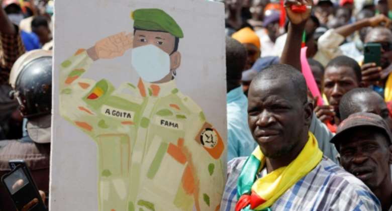 Support: A pro-junta and pro-Russia rally in Bamako in May.  By OUSMANE MAKAVELI AFP