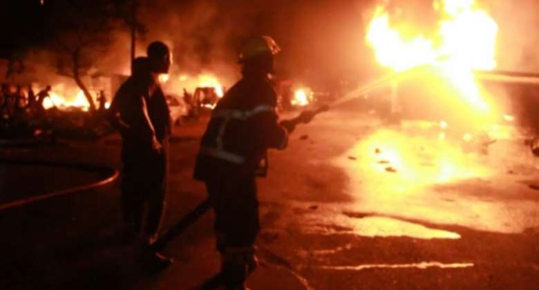 The blast happened when a fuel tanker collided with another truck at a petrol station on Friday night.  By - AFP