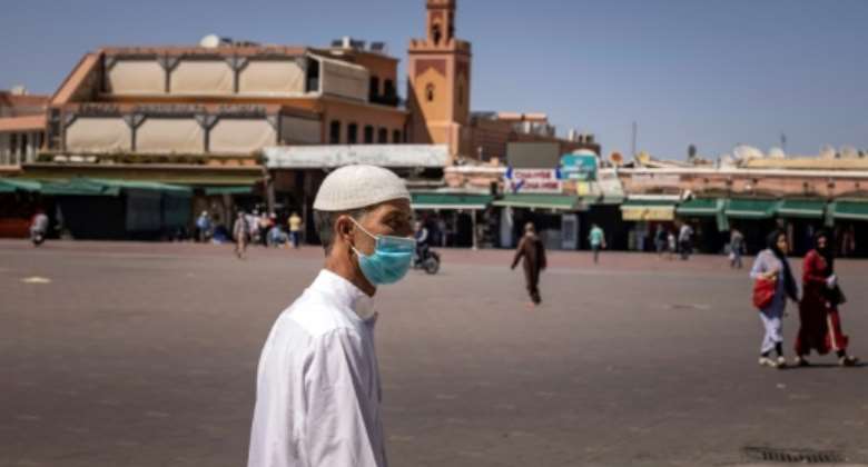 The famed Jemaa el-Fna square in the heart of Moroccan city of Marrakesh is normally packed with foreign tour groups but has been left virtually deserted by the Covid pandemic.  By FADEL SENNA (AFP/File)
