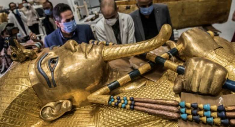 The golden sarcophagus of the Egyptian pharaoh Tutankhamun in a restoration lab at the newly-built Grand Egyptian Museum in Giza.  By Khaled DESOUKI AFPFile