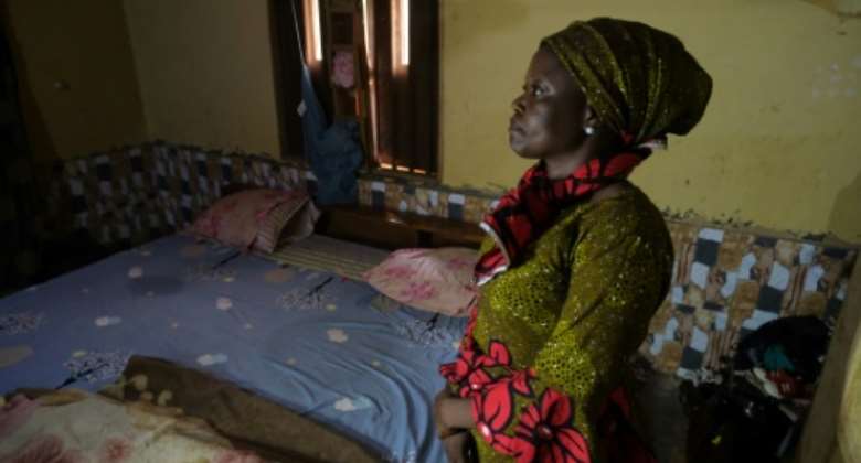 The long wait: Hassana Ayuba, whose 14-year-old daughter Judith was among 140 students kidnapped in Kaduna state last month.  By Kola Sulaimon AFP