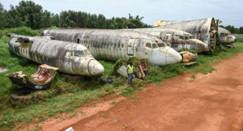 The planes were abandoned after Ivory Coast's post-election civil war in 2011 -- entrepreneur Aziz Alibhai wants to turn them into a hotel and conference centre.  By Sia KAMBOU AFP