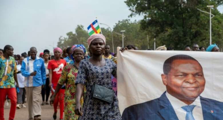 Touadera supporters marched in August to demand constitutional changes enabling him to run for a third term.  By Barbara DEBOUT AFPFile