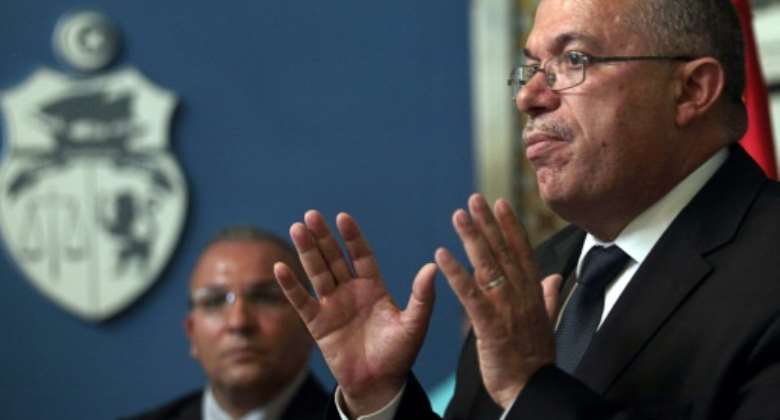 Tunisian former justice minister Noureddine Bhiri, seen here in 2012, was arrested by plainclothes officers on Friday and later accused of possible 'terrorism' offences.  By Fethi Belaid (AFP/File)
