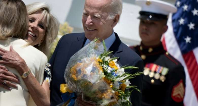 US President Joe Biden, seen welcoming Ukrainian First Lady Olena Zelenska to the White House, will hold a summit of African leaders in December 2022.  By Brendan Smialowski AFP