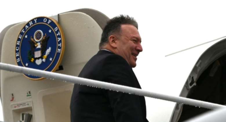 US Secretary of State Mike Pompeo boards his plane at Andrews Air Force Base en route to Munich on a trip that will include his first tour of sub-Saharan Africa.  By Andrew CABALLERO-REYNOLDS POOLAFP