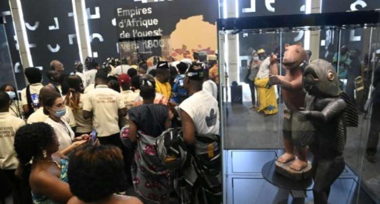 Visitors were allowed to view artefacts returned from France nearly 130 years after they were looted by colonial forces.  By PIUS UTOMI EKPEI AFP