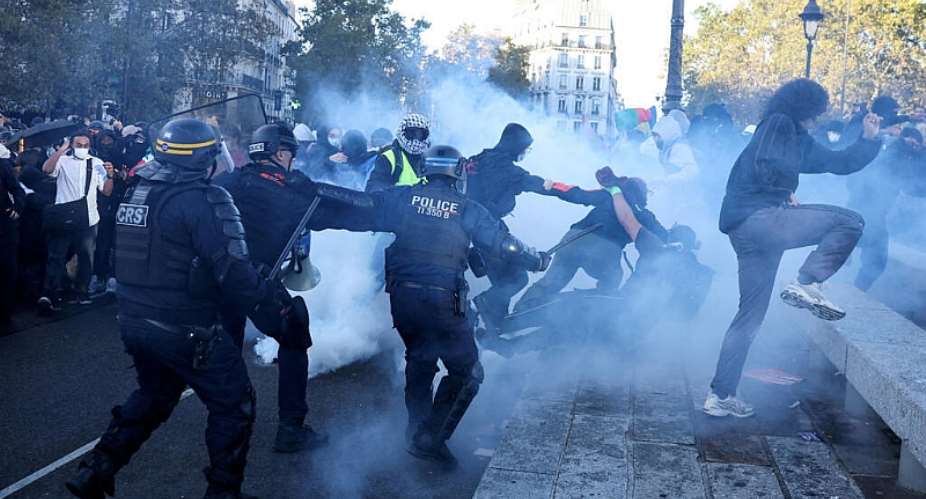 Police officers in riot gear clash with demonstrators during nationwide protests in Paris, France, to demand better school conditions on October 8, 2026, -  Pedro Nunes, Reuters