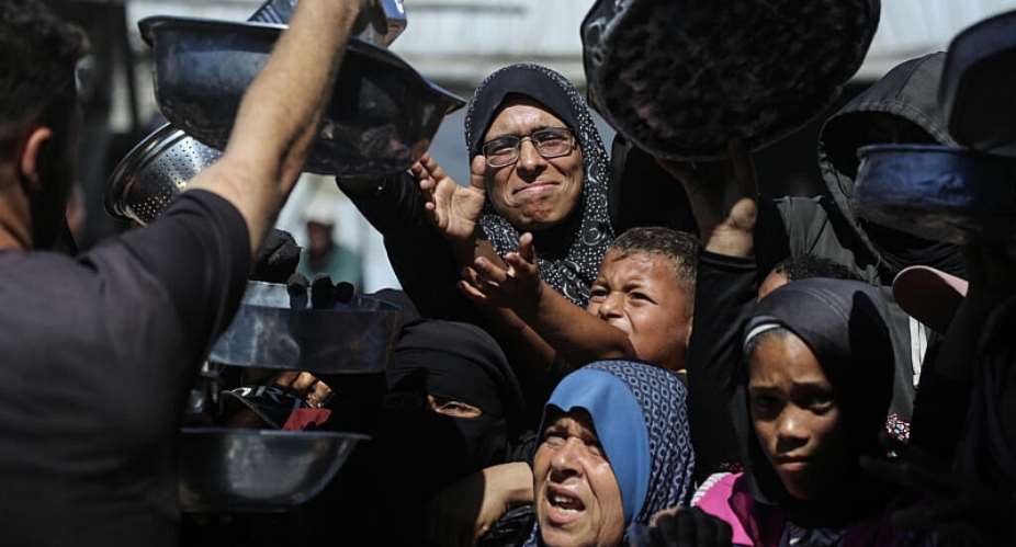 Nihaya Al-Masri is struggling to feed her family of 10 people, who are surviving on one meal a day -  Bashar Taleb / AFP