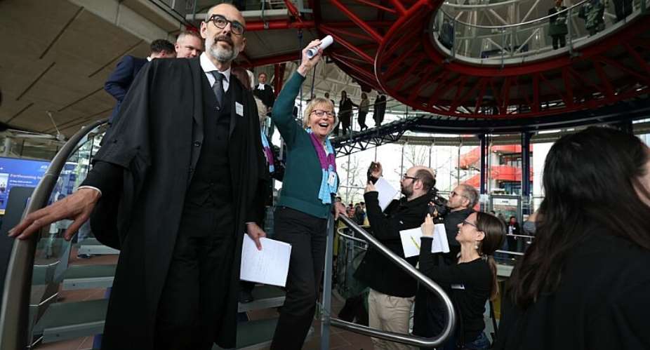 Swiss retirees celebrate a landmark victory at the European Court of Human Rights in April 2024, when the court for the first time found Switzerland responsible for failing to take sufficient action against climate change. -  Frederick FLORIN / AFP