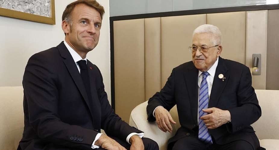 French President Emmanuel Macron, left, with Palestinian President Mahmoud Abbas on the sidelines of the Gaza International Peace Summit, in Sharm el-Sheikh, Egypt, Monday, 13 October 2025. - AP - Yoan Valat