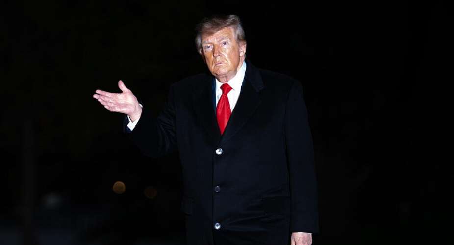President Donald Trump waves while returning to the White House following a domestic trip in October. -  Nathan Howard, AP