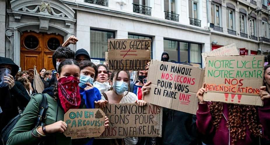 High school students block the entrance of Ampere High School in Lyon, central-eastern France, on 1 October, 2026. -  AFP/Olivier Chassignole