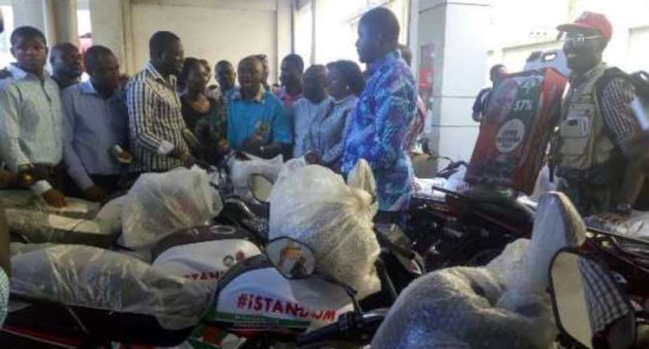 iStand4JM Youth Group donates motorbikes to NDC